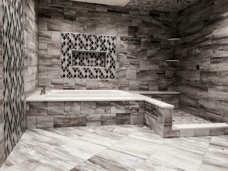 Wood-look tile tub surround with mosaic niche, New Jersey